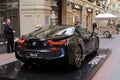 Luxury BMW i8 hybrid electric coupe on sale at the State Department Store in Moscow. Back view.